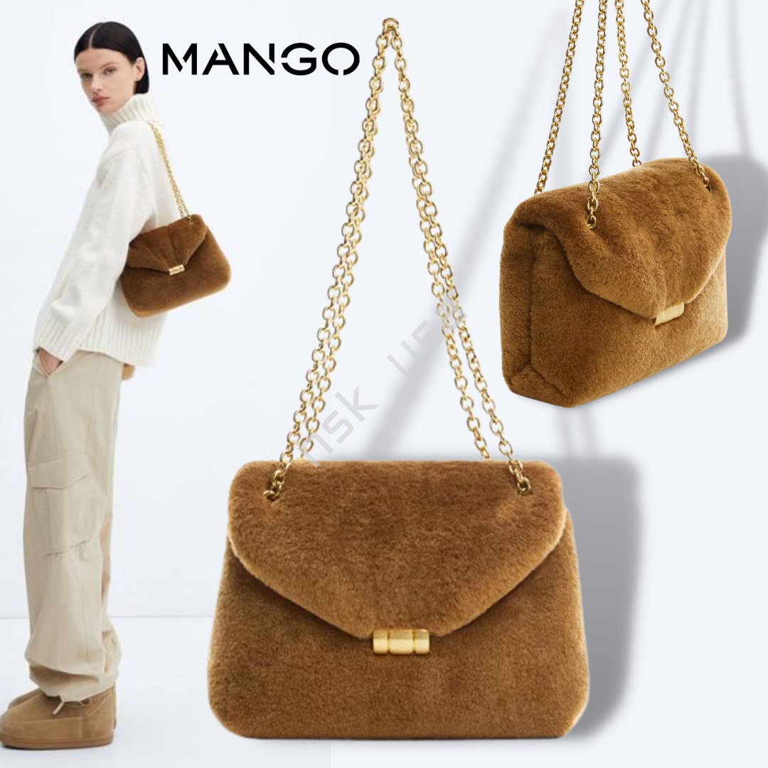 https://www.macys.com/shop/product/<b>mango</b>-womens-padded-faux-fur-chain-handl...